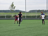 Laatste training S.K.N.W.K. JO11-1JM (partijtje tegen de ouders) van maandag 27 mei 2024 (55/137)